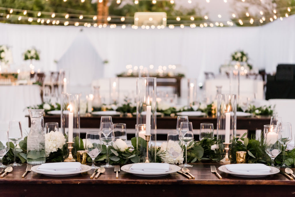white rustic wedding with greenery 