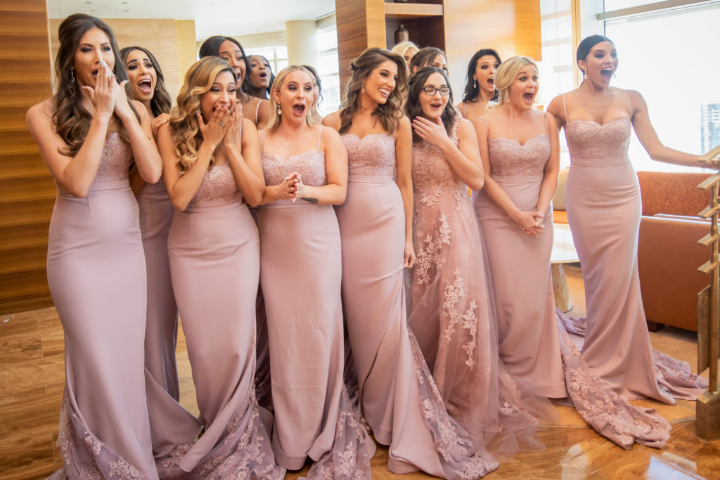 bride first look with bridesmaids 